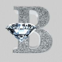 a large diamond encrusted B with a spinning diamond on top